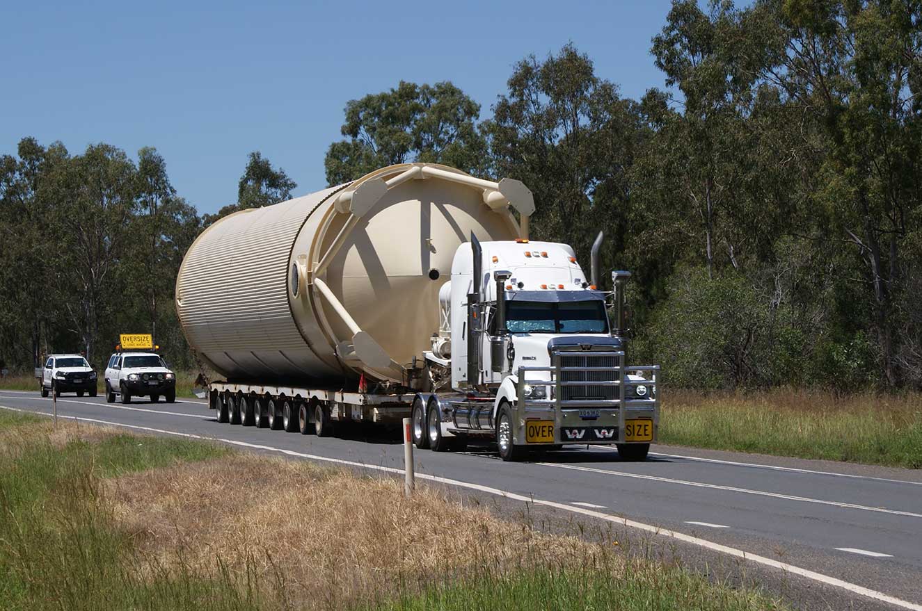 Moving 270 000 fuel tank on the back of a large white truck