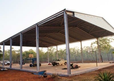 Construction of a roof over a basketball court in Gan Gan